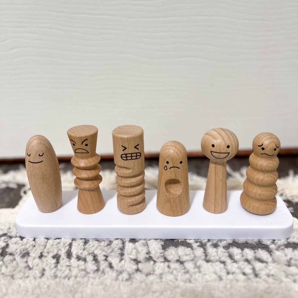 Lovevery wooden emotion dolls